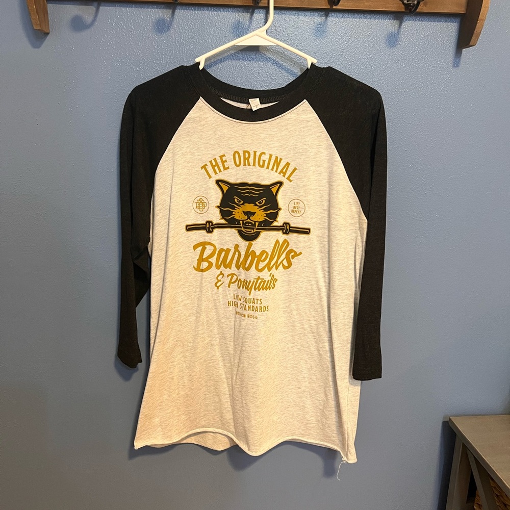 3/4 sleeve barbells and pony tails top